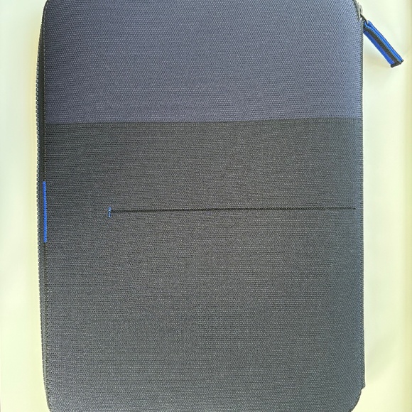 Rothy's Handbags - Rothy’s black and navy laptop sleeve